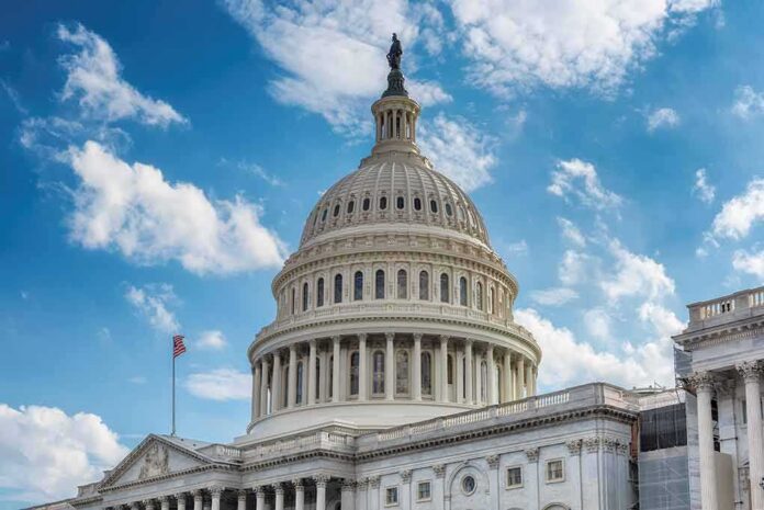 United States Capitol dome under a partly cloudy sky