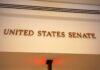 DSA’s Power Play: Senate On The Chopping Block Sign displaying United States Senate in a government building
