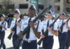 cadets marching in formation with rifles