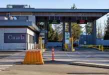 1930 Law Revived: Canada Tariff Shock Canada border crossing booths with open and closed lane signs