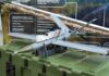 Plywood Drones Outsmart NATO-Grade Jamming small military drone displayed on a green equipment case