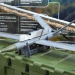 small military drone displayed on a green equipment case
