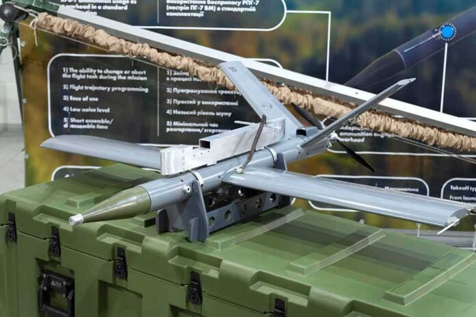 shutterstock_2000674850 small military drone displayed on a green equipment case