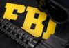 FBI lettering with tactical rifle and goggles