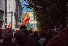 Times Square Overrun Before Final Crowd with Spanish flags in a city street