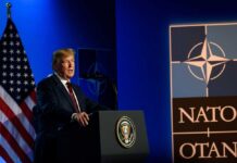 U.S. president delivering a speech at a NATO summit