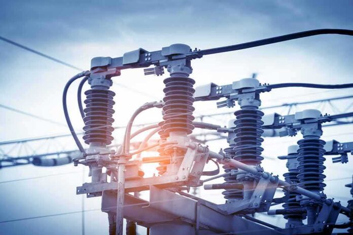 shutterstock_394870285 Electrical substation insulators and switchgear