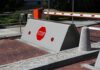 Rising road blocker with stop sign at a security checkpoint