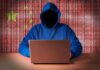 FBI Nukes China’s Hacker Pipeline Hooded figure using a laptop