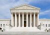 Jeffries Targets Supreme Court Power Front view of the Supreme Court building with large columns and steps under a blue sky