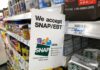 USDA Greenlights Florida’s SNAP Shock Shelf sign in a grocery aisle showing SNAP EBT acceptance