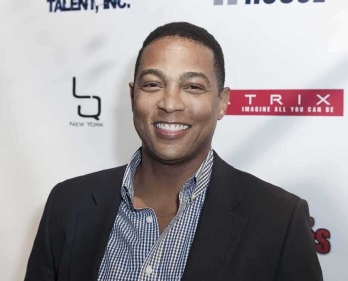 smiling man at event backdrop