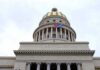 Diplomatic Gambit in Havana Stuns Washington Capitol building dome with columns and a flag