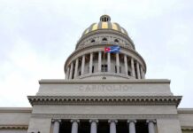 Diplomatic Gambit in Havana Stuns Washington Capitol building dome with columns and a flag