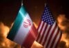 Economic Freefall Rattles Tehran’s Elite Iran and United States flags side by side