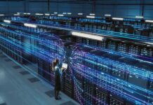 Ratepayer Rebellion Forces Exelon Clampdown Technician with laptop in a large data center aisle