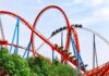 Viral Coaster Freeze Misleads — Here’s Why Colorful roller coaster with riders on a sunny day