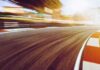 race track curve at sunset with motion blur