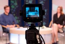 Double Entendre Wrecks Morning Show Camera focused on a television studio interview with two seated hosts