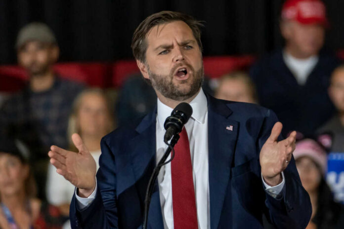 54801cb8-0515-4c34-a2d8-f79705e6683e_shutterstock2542628059jpg.jpeg-8 Man in suit speaking at a podium
