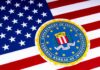 FBI Hiring Shift Raises Serious Questions FBI seal overlaid on the United States flag