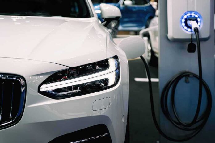 electric car charging at a station