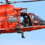 Seven Days Missing, Then A Dramatic Rescue Rescue helicopter with crew performing hoist operation