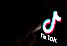 TikTok Slammed: Alabama Forces Curfew TikTok logo on a smartphone screen