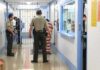ICE Warrants Face A Constitutional Home Barrier Corrections officers escort an inmate in a jail hallway