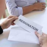 Pentagon Tensions Trigger Army Secretary’s Exit Person handing over a resignation letter in an envelope