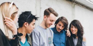 Group of friends looking at a smartphone