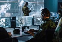Russia’s Sabotage Pipeline Exposed Military analysts at computers in a command center