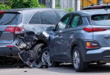 Two SUVs in a side-impact collision on a city street