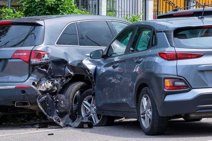 Two SUVs in a side-impact collision on a city street