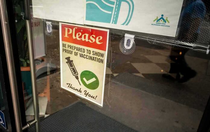 vaccination notice on a glass door