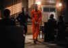 Did Prison Policy Lead to Zarutska’s Murder? Inmate in orange jumpsuit escorted by officer in courtroom