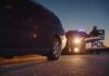 Kentucky Trooper Killed During I-65 Stop Police officer at patrol car during traffic stop at dusk