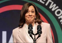 Harris Joins El-Sayed for Michigan Health Event woman at podium with two microphones