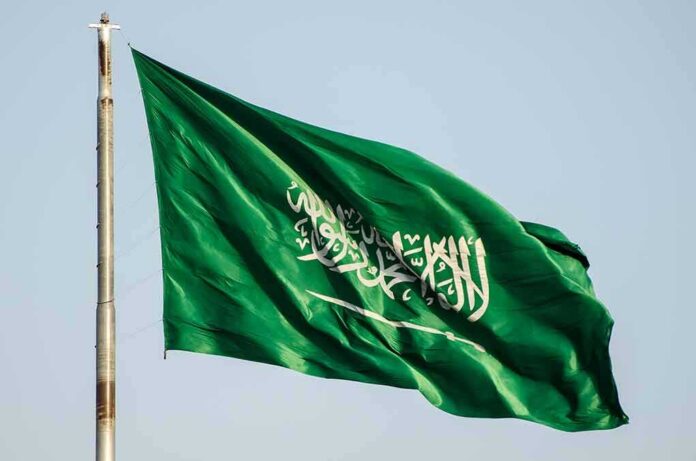 shutterstock_724687612-3 Saudi Arabia flag waving on a pole