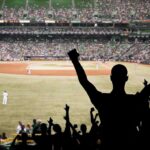 Angels’ Century Crash Stuns MLB Crowd of fans cheering at a baseball game in a stadium