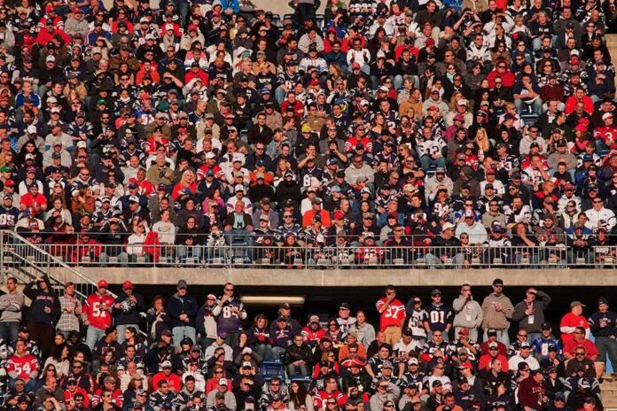shutterstock_133676561-1 Peter Keys in a large stadium crowd of football fans