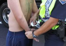 Bodycam Fury, Missing Context Police officer handcuffing a shirtless person roadside