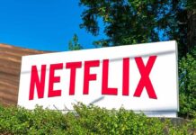 Layoffs, Then This: Netflix’s Bold Gambit Netflix sign at outdoor campus