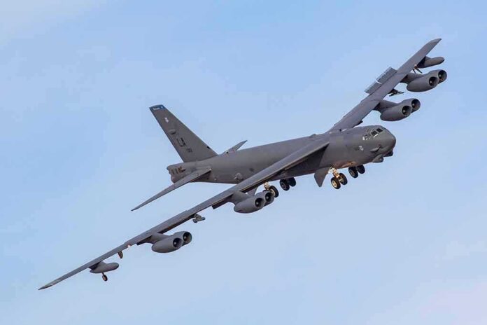 shutterstock_1691982994-1 Military bomber aircraft banking in flight
