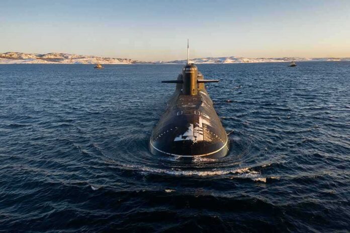 Submarine cruising on cold open water toward camera