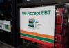 storefront sign stating EBT accepted