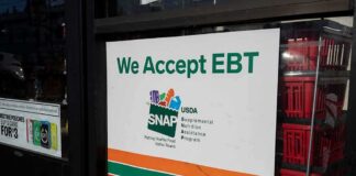 storefront sign stating EBT accepted