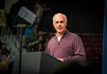 Indiana Candidate’s Changing Story Fuels Viral Forum Fallout Bob P. Casey, Jr. speaking at a podium with microphones and teleprompter