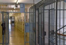 He Sought Death, Then Waived His Appeals Prison corridor with barred doors