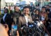 Oct. 7 Firestorm Engulfs NYC Mayor Zohran Mamdani speaks at a press conference; Julia Bacha is visible among the crowd